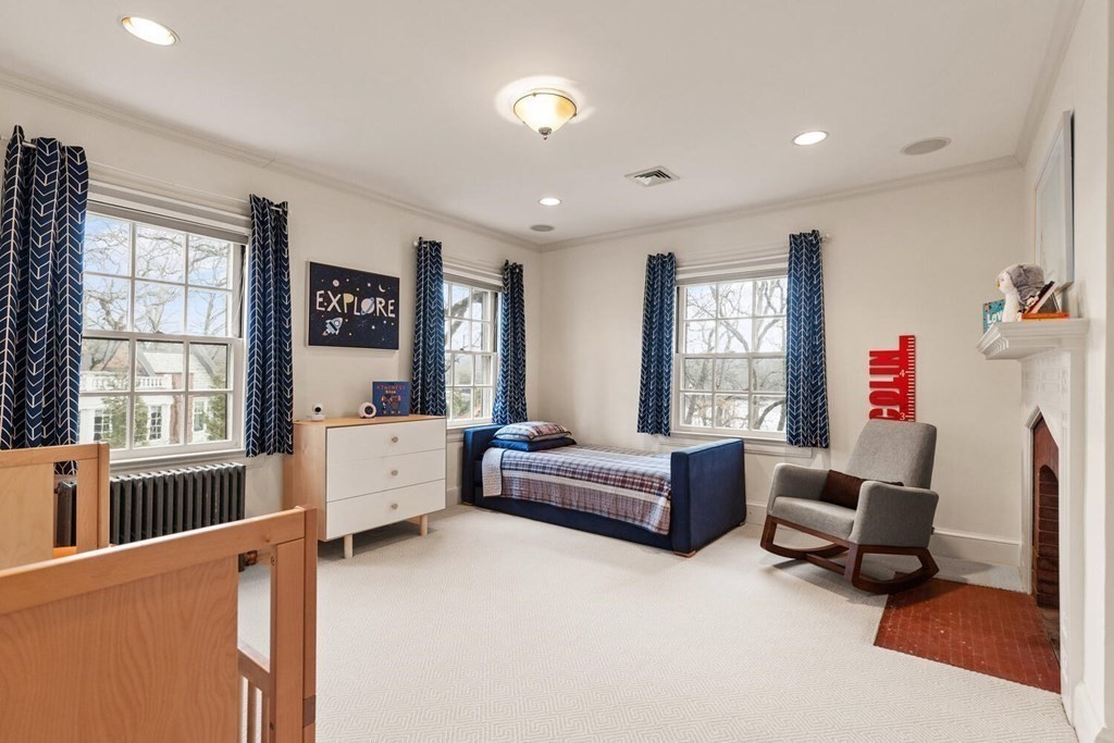 32 Everett Avenue Winchester, MA 01890 - Photo 29 of 42 a living room with furniture and a window