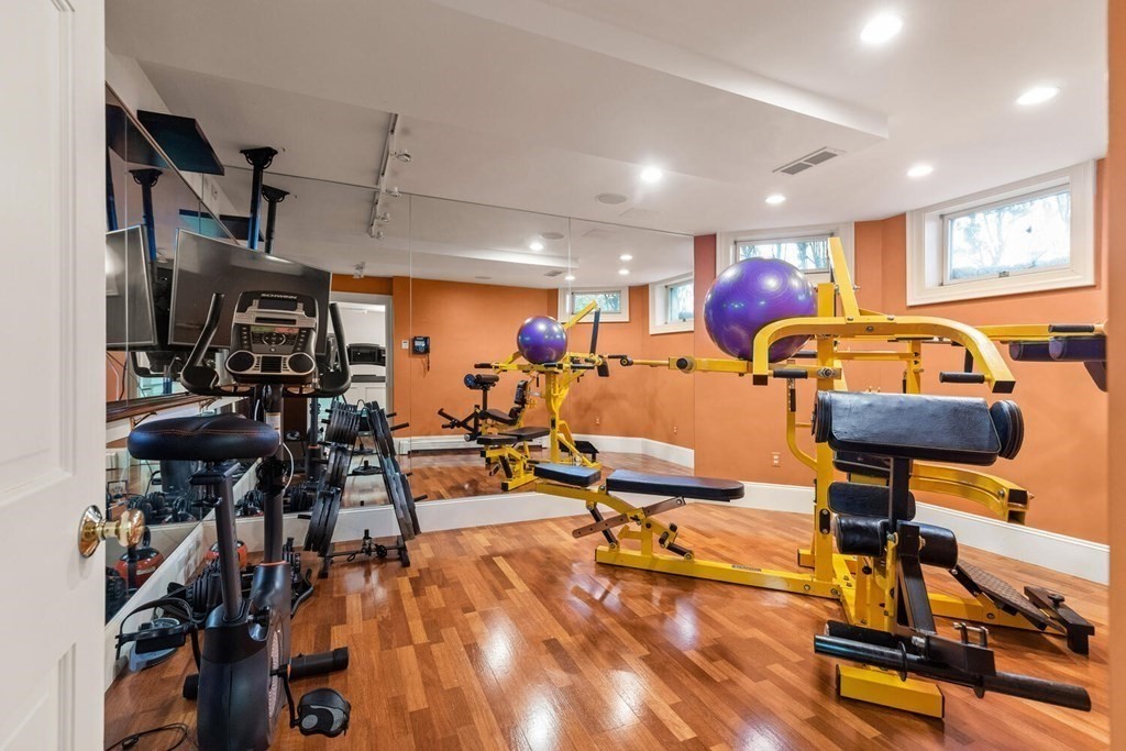 32 Everett Avenue Winchester, MA 01890 - Photo 32 of 42 a view of a room with gym equipment