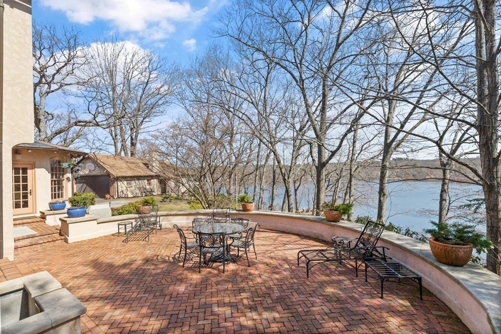 32 Everett Avenue Winchester, MA 01890 - Photo 35 of 42 a view of a park with bench and trees