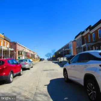 a view of small house with front door