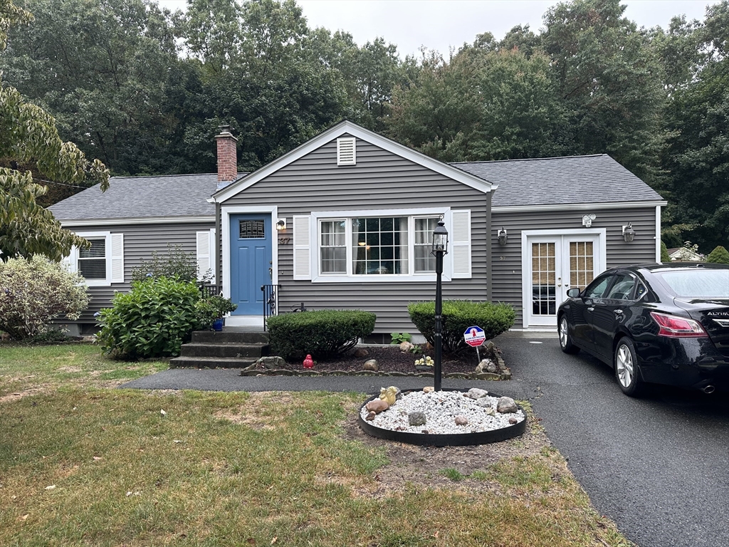 37 Bretton Road Springfield, MA 01119 - Photo 1 of 36 a front view of a house with a yard and garage