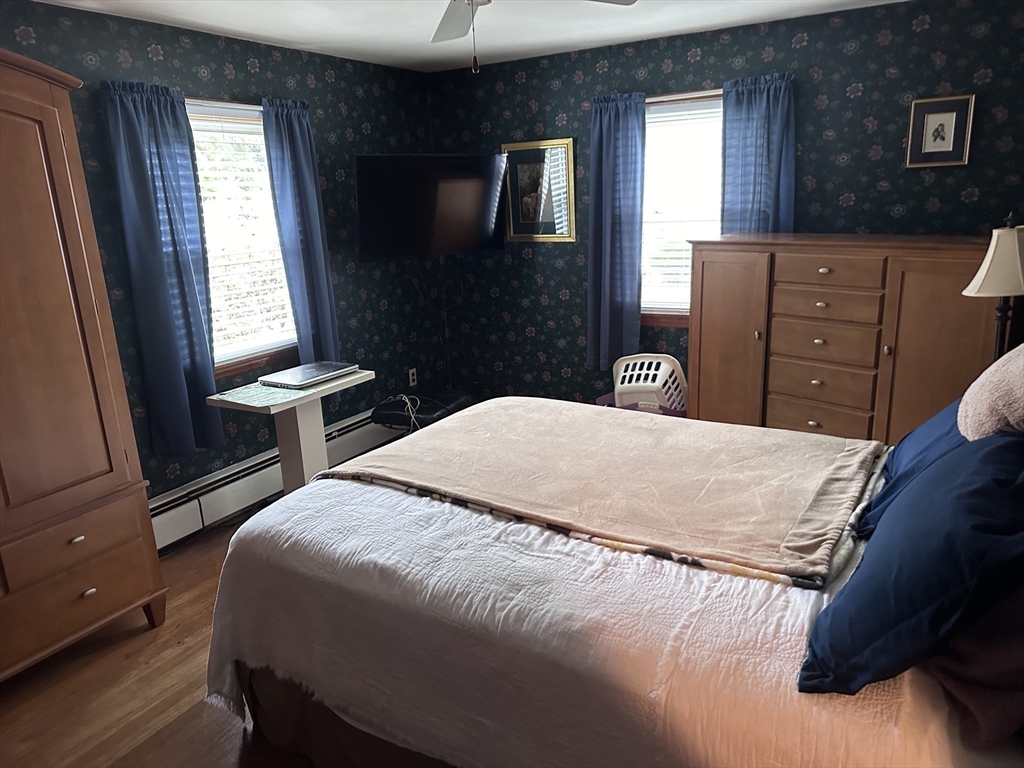 37 Bretton Road Springfield, MA 01119 - Photo 27 of 36 a bedroom with a bed and a dresser