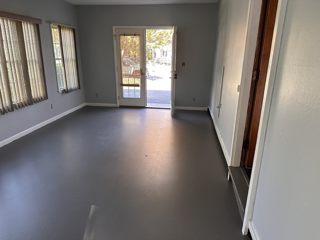 37 Bretton Road Springfield, MA 01119 - Photo 30 of 36 an empty room with wooden floor and windows