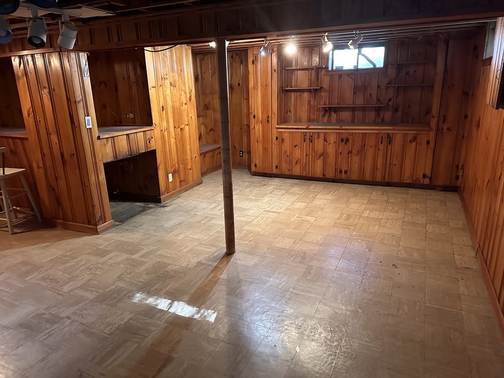37 Bretton Road Springfield, MA 01119 - Photo 34 of 36 a view of an empty room with wooden floor and windows