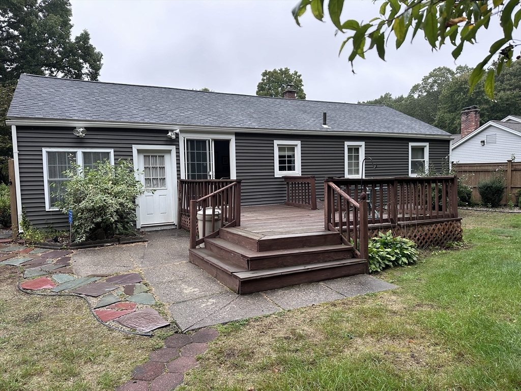 37 Bretton Road Springfield, MA 01119 - Photo 4 of 36 a view of a house with wooden deck and furniture