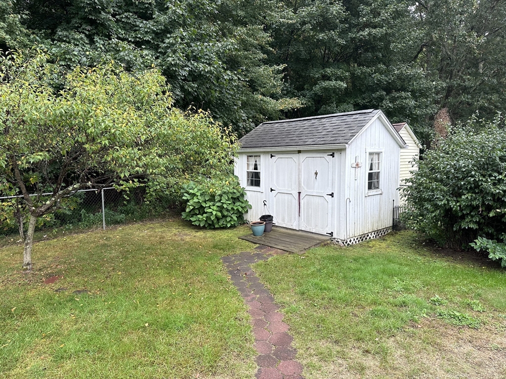 37 Bretton Road Springfield, MA 01119 - Photo 5 of 36 a view of a backyard with a garden