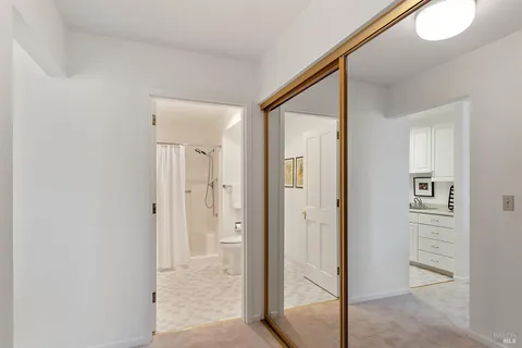a view of entryway with bathroom