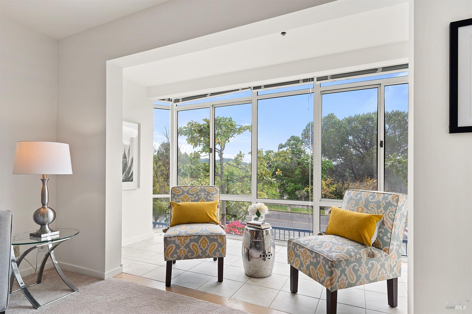 100 Thorndale Drive, Unit 149 San Rafael, CA 94903 - Photo 4 of 38 a living room with furniture and a window