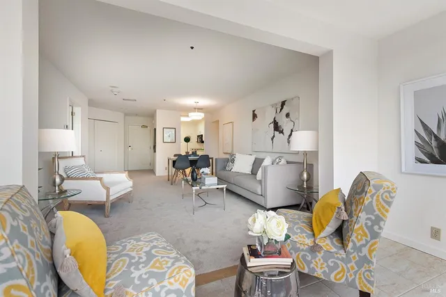 a living room with furniture and a couch