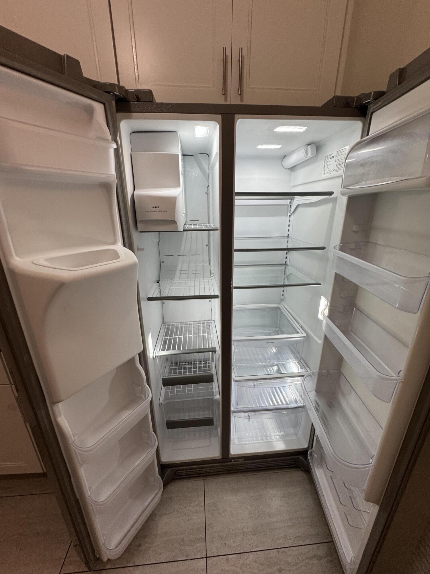 9777 Nickels Boulevard, Unit 705 Boynton Beach, FL 33436 - Photo 13 of 41 a view of storage and utility room