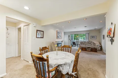 a view of a livingroom with furniture and window
