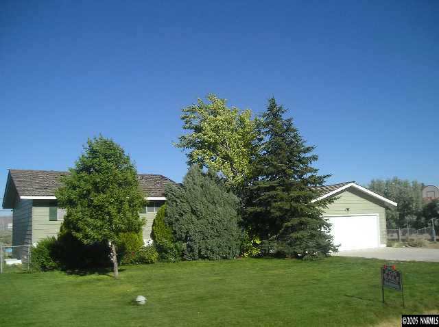 10740 Osage Road Reno, NV 89508 - Photo 1 of 1 a view of a house with a yard