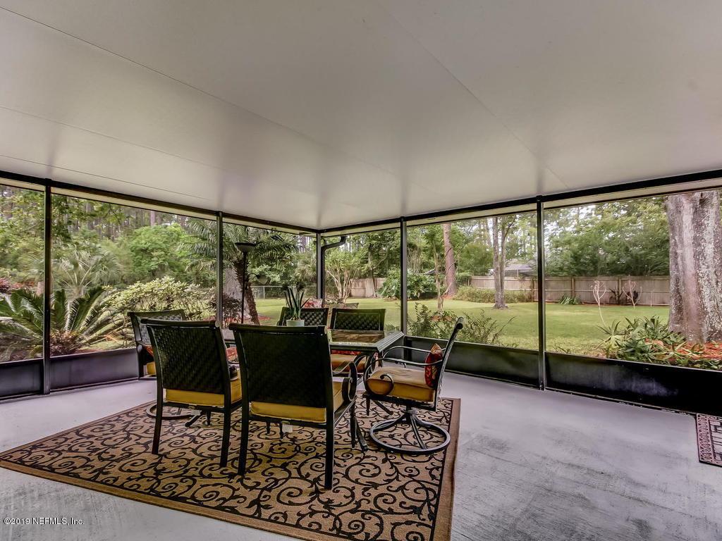3470 Washburn Road Jacksonville, FL 32250 - Photo 40 of 50 Screen Enclosed Porch at Rear of Home