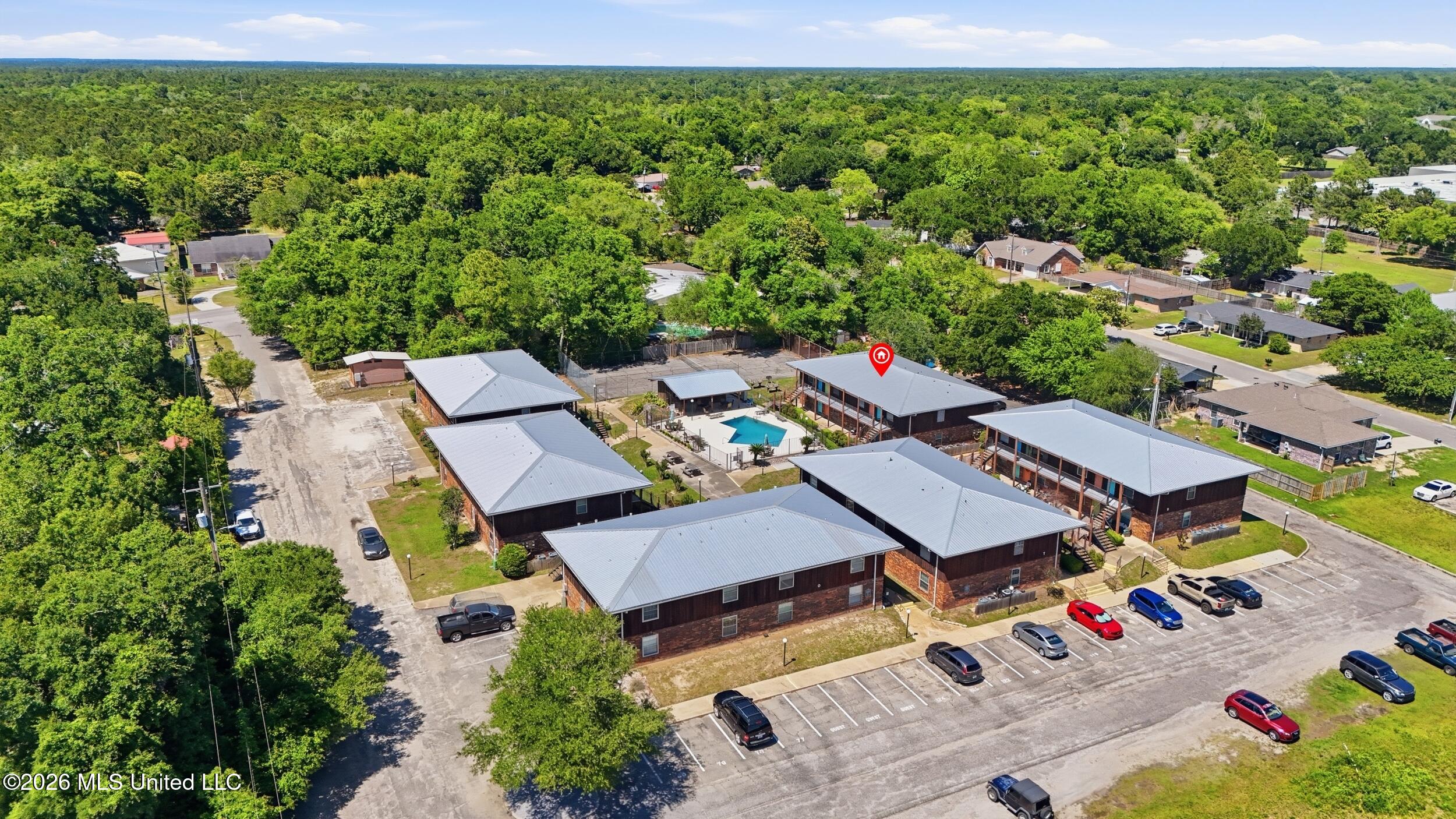 1550 East 2nd Street, Unit R105 Pass Christian, MS 39571 - Photo 29 of 36 32_dji_20260504144803_0038_d_stamped_cbf