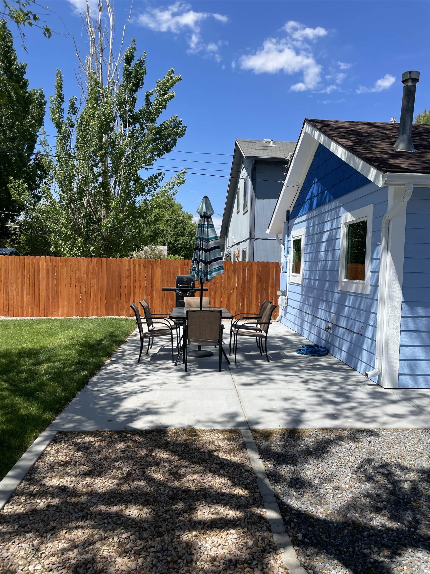 159 North Willow Street Fruita, CO 81521 - Photo 4 of 9 a backyard of a house with seating space