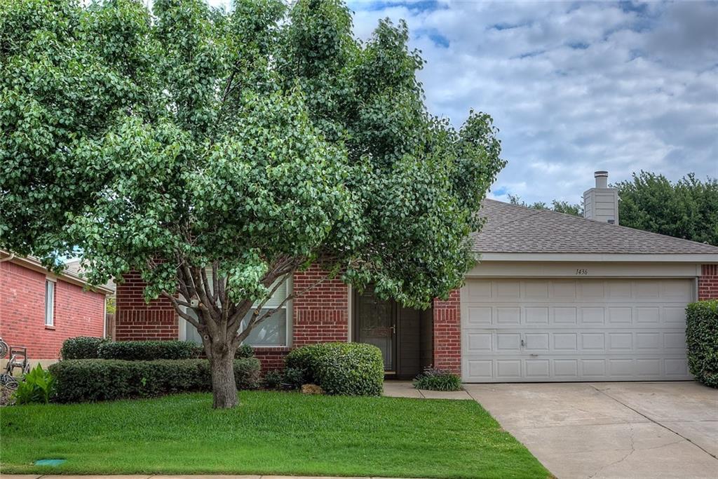 1436 Ridgecrest Drive Little Elm, TX 75068 - Photo 1 of 1 a front view of a house with a garden