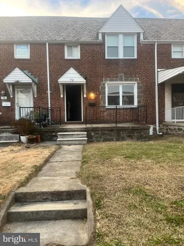 a view of a house with a swimming pool