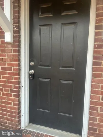 a bathroom with a glass door shower