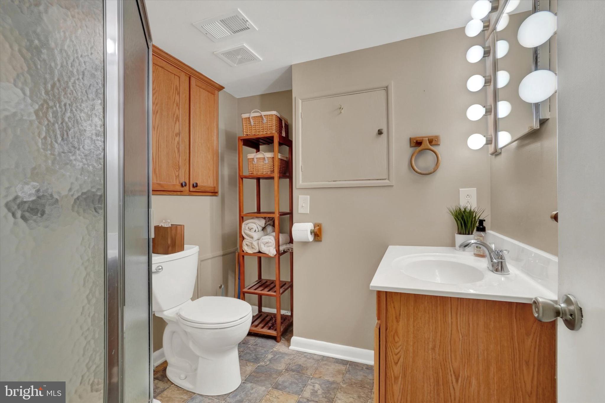 111 Dixie Drive Red Lion, PA 17356 - Photo 20 of 28 a bathroom with a toilet sink and shower