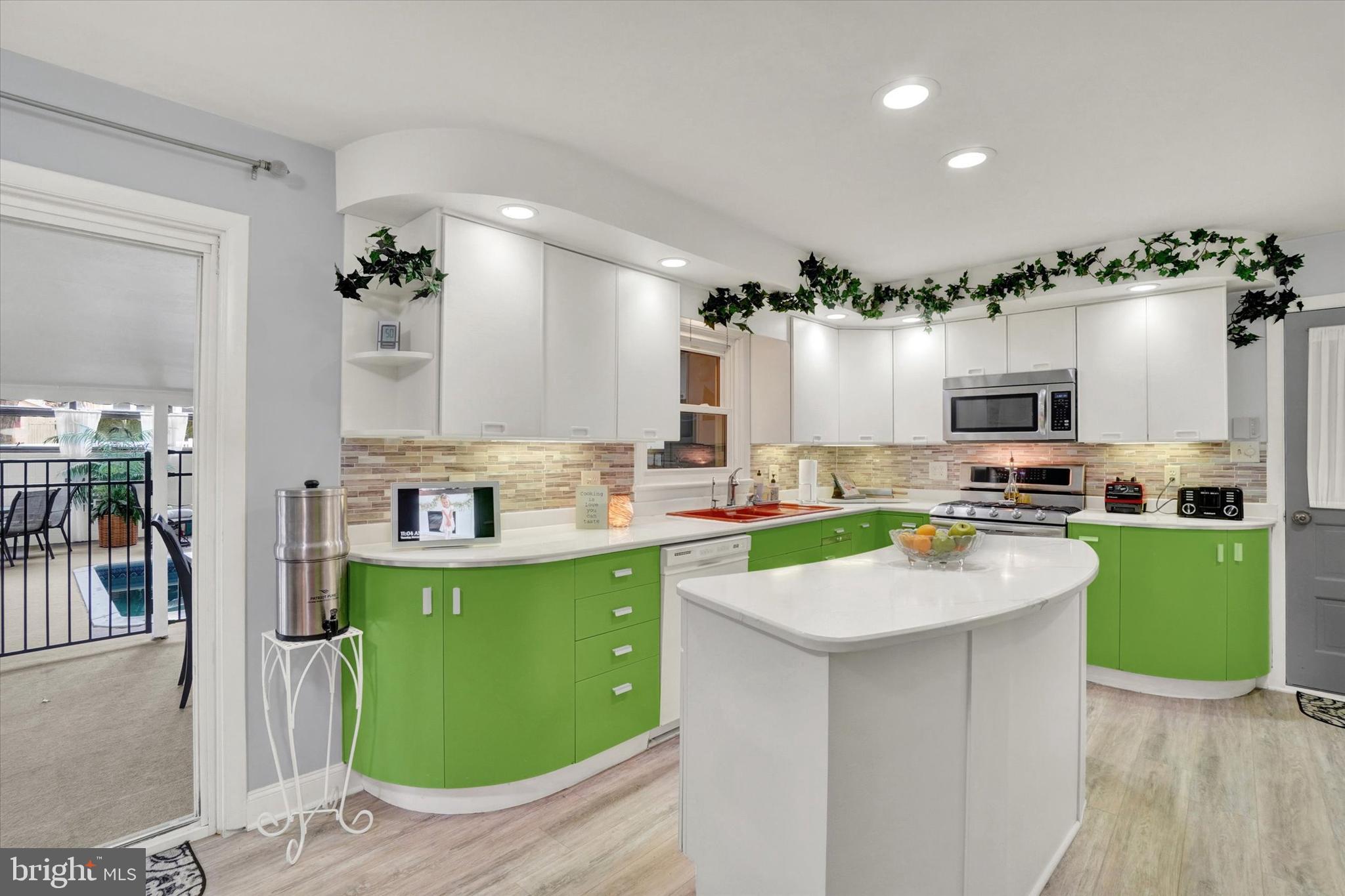 111 Dixie Drive Red Lion, PA 17356 - Photo 8 of 28 a kitchen with a sink cabinets and wooden floor