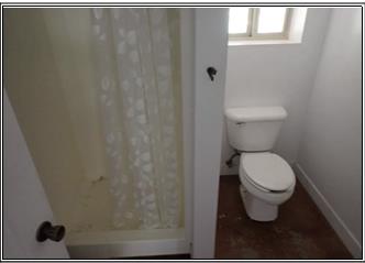 2251 Folendorf Road Murphys, CA 95247 - Photo 38 of 39 a white toilet sitting next to a shower