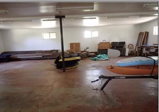 2251 Folendorf Road Murphys, CA 95247 - Photo 39 of 39 a living room with furniture gym equipment and a large window