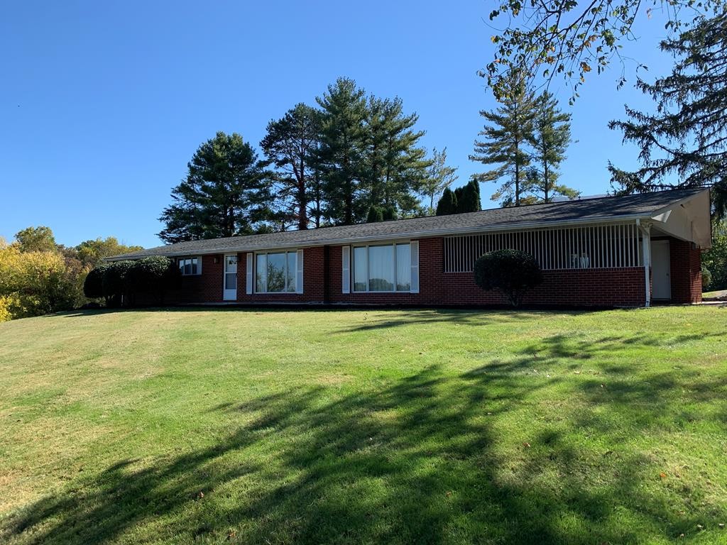 201 County Line Road Dandridge, TN 37725 - Photo 23 of 23 a front view of a house with a garden