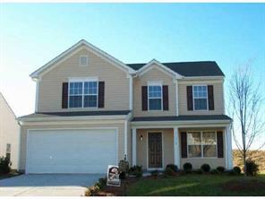 11310 Chapeclane Road Charlotte, NC 28278 - Photo 1 of 1 a front view of a house with garden
