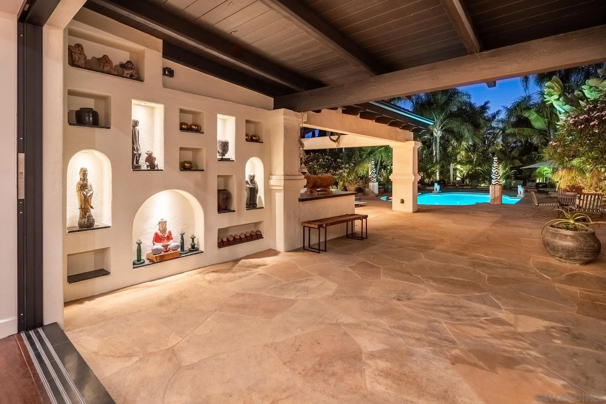 18245 Paseo Victoria Rancho Santa Fe, CA 92067 - Photo 13 of 50 a view of a livingroom with furniture and a garage