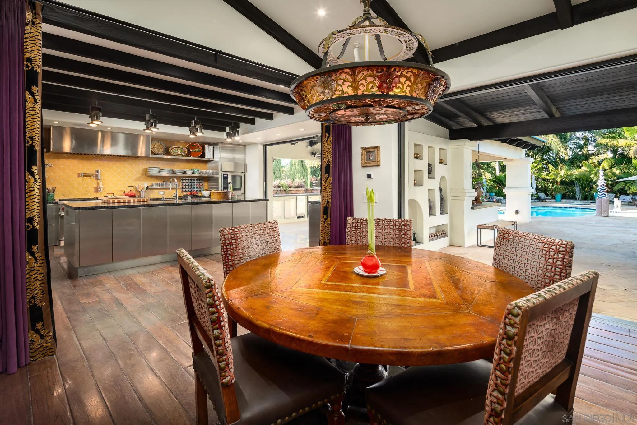 18245 Paseo Victoria Rancho Santa Fe, CA 92067 - Photo 15 of 50 a view of a dining room with furniture window and outside view