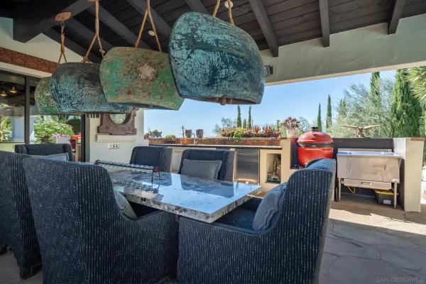 a kitchen with a sink and a stove
