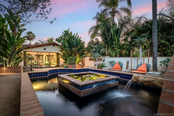 a view of a house with swimming pool