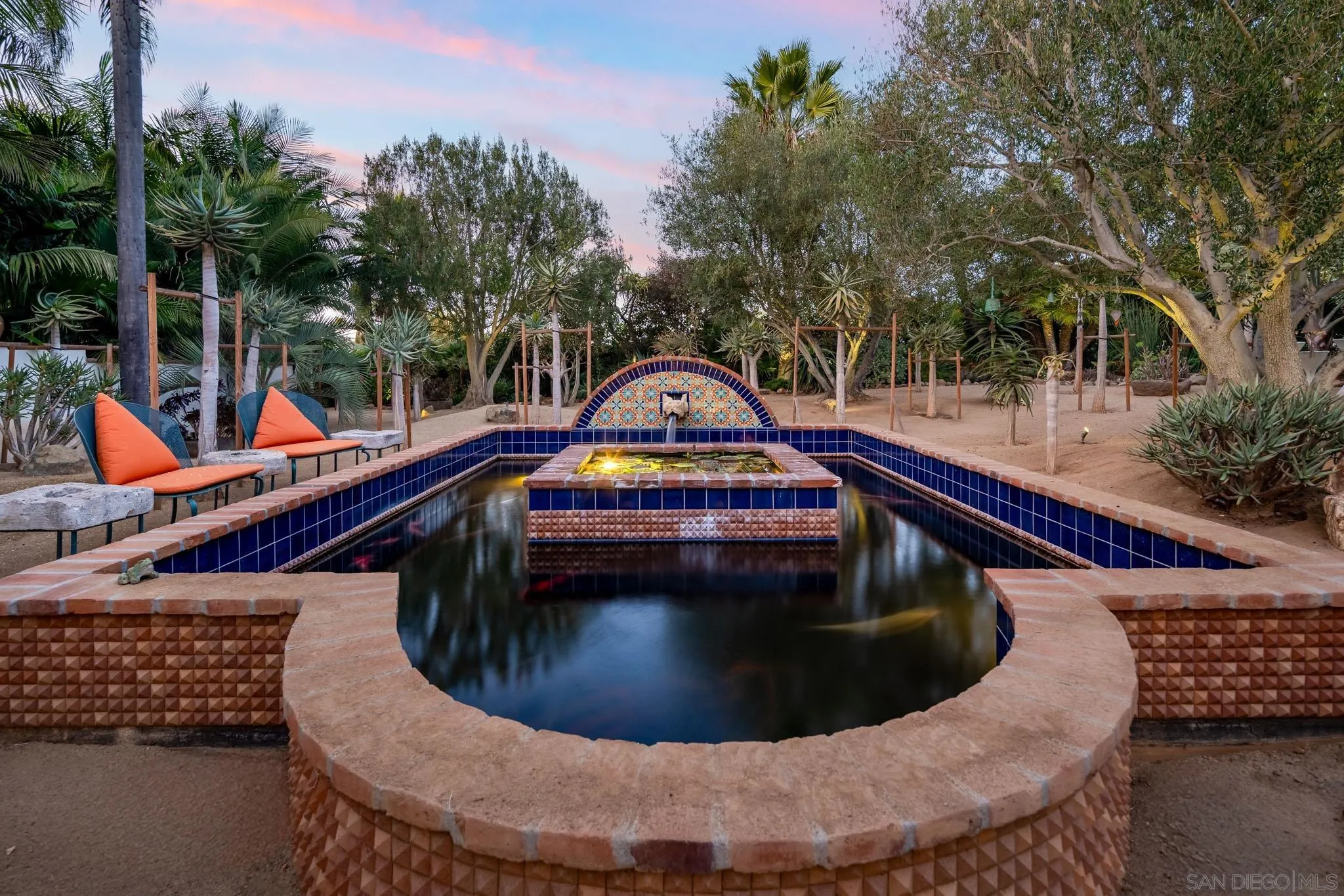 18245 Paseo Victoria Rancho Santa Fe, CA 92067 - Photo 31 of 50 a view of a house with swimming pool