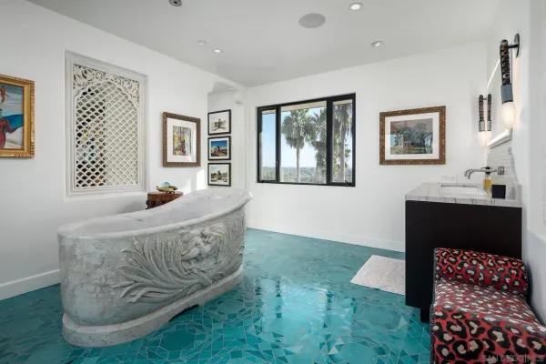 a view of a swimming pool with a lounge chairs