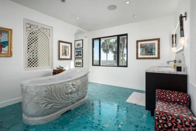a view of a swimming pool with a lounge chairs