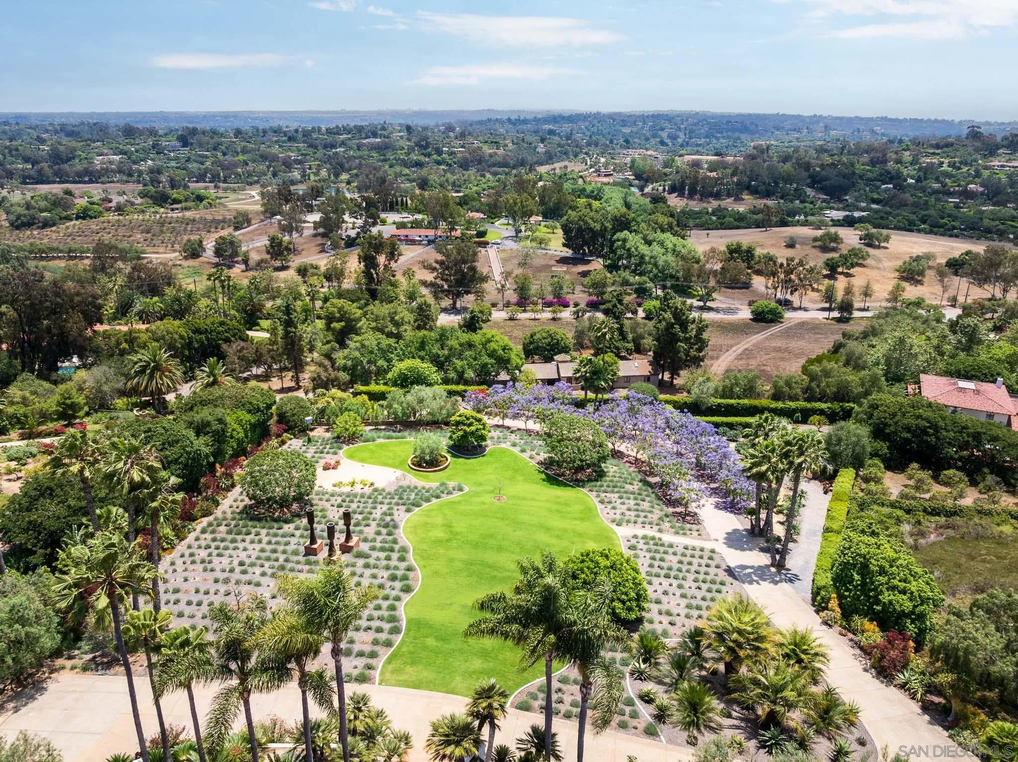 18245 Paseo Victoria Rancho Santa Fe, CA 92067 - Photo 5 of 50 an aerial view of residential houses with outdoor space and trees