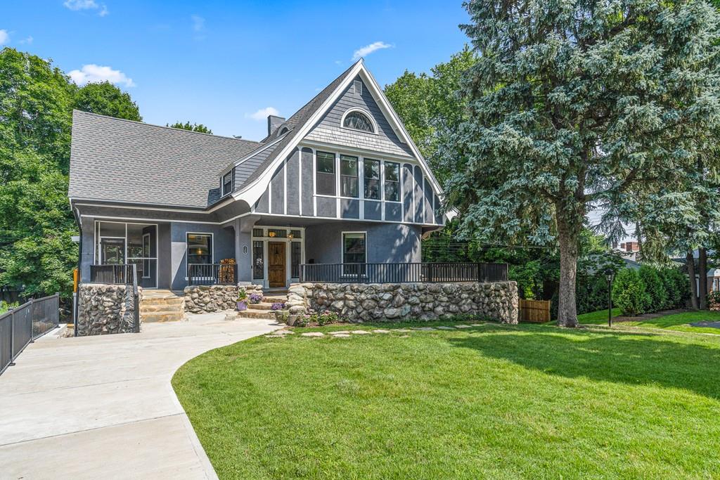 a front view of a house with garden