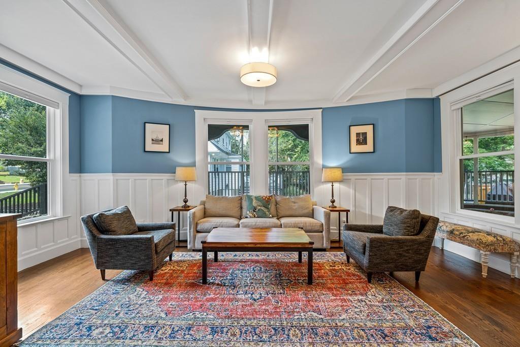 125 Walnut Street Dedham, MA 02026 - Photo 12 of 37 a living room with furniture and a potted plant
