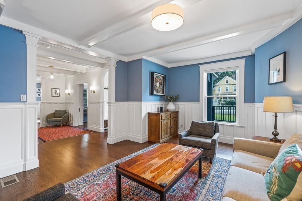 125 Walnut Street Dedham, MA 02026 - Photo 13 of 37 a living room with furniture and a table