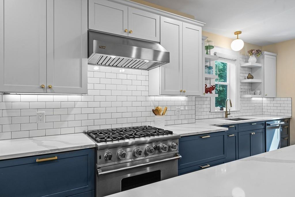 125 Walnut Street Dedham, MA 02026 - Photo 21 of 37 a kitchen with a stove and a sink