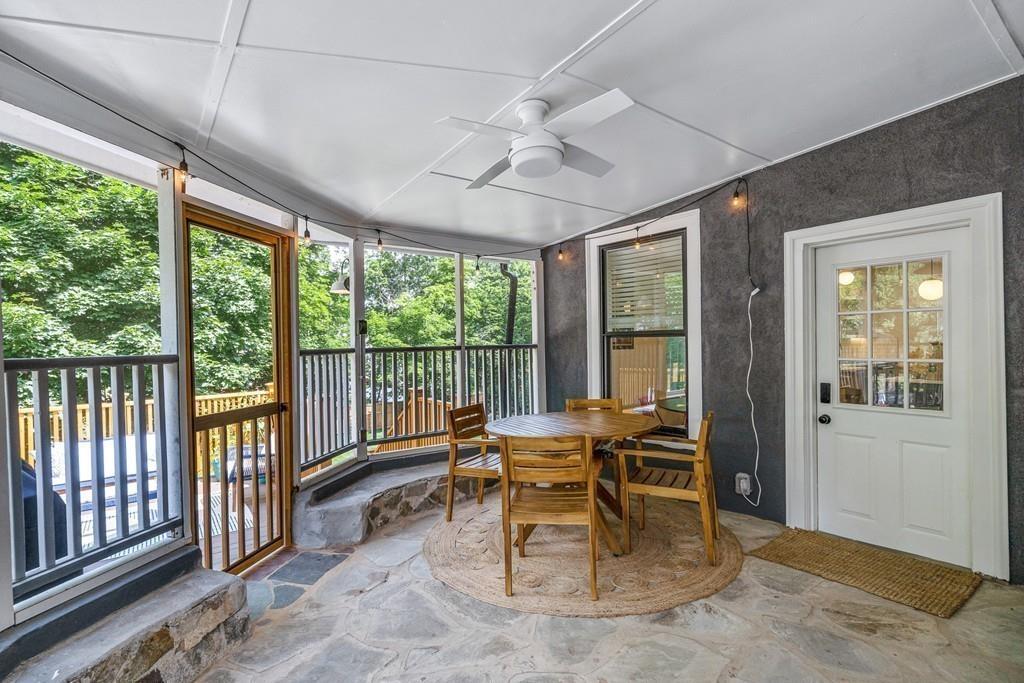 125 Walnut Street Dedham, MA 02026 - Photo 32 of 37 a view of a dining room with furniture window and outside view