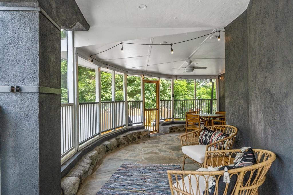 125 Walnut Street Dedham, MA 02026 - Photo 33 of 37 a living room with furniture and a large window