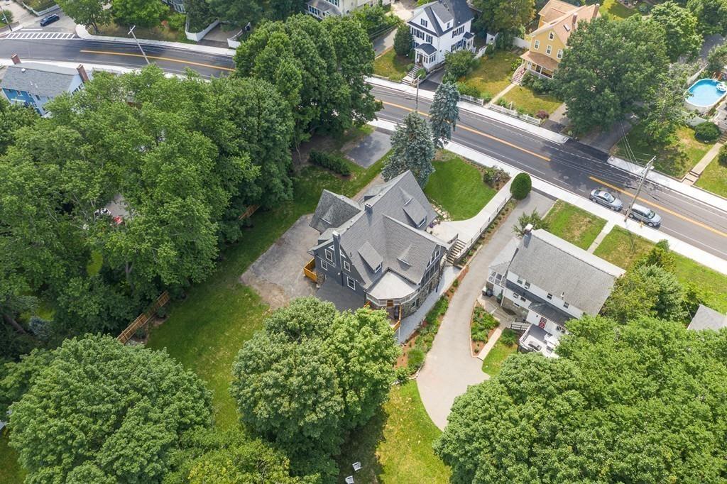 125 Walnut Street Dedham, MA 02026 - Photo 35 of 37 an aerial view of a house with outdoor space and a lake view