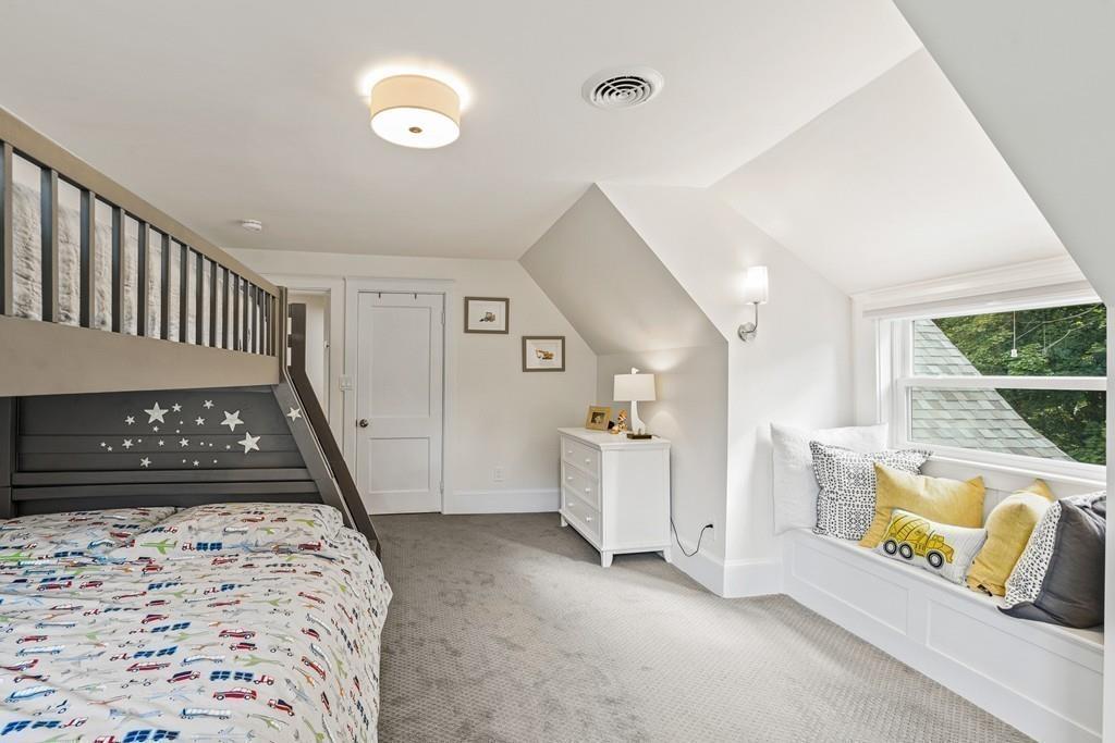 125 Walnut Street Dedham, MA 02026 - Photo 7 of 37 a bedroom with furniture and window