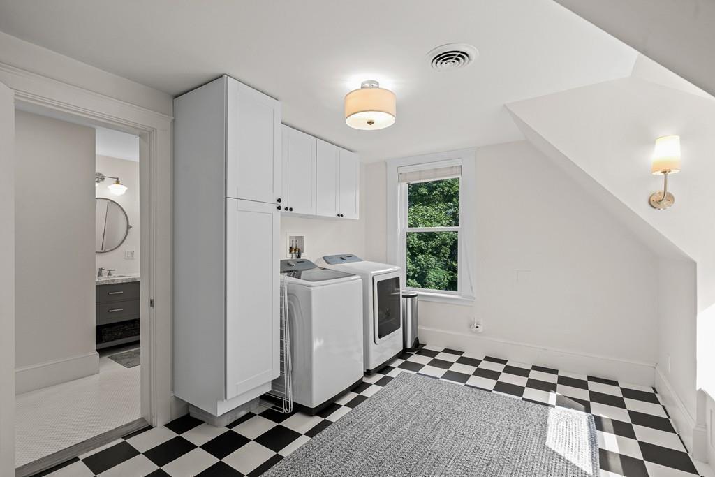 125 Walnut Street Dedham, MA 02026 - Photo 9 of 37 a kitchen with a refrigerator and a stove