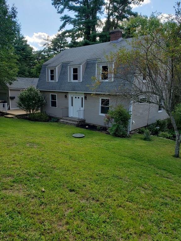 198 Lebanon Hill Road Southbridge, MA 01550 - Photo 1 of 37 a view of a house with a garden