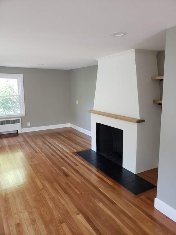 198 Lebanon Hill Road Southbridge, MA 01550 - Photo 12 of 37 an empty room with windows and fireplace