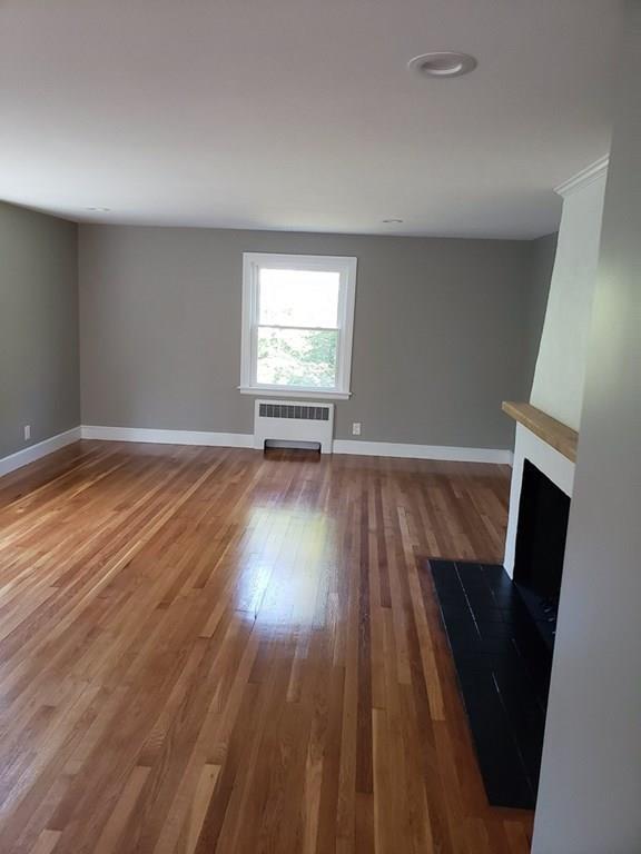 198 Lebanon Hill Road Southbridge, MA 01550 - Photo 14 of 37 wooden floor in an empty room with a window