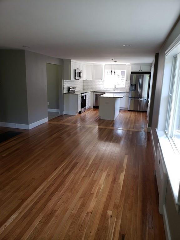 198 Lebanon Hill Road Southbridge, MA 01550 - Photo 15 of 37 a living room with furniture and a wooden floor