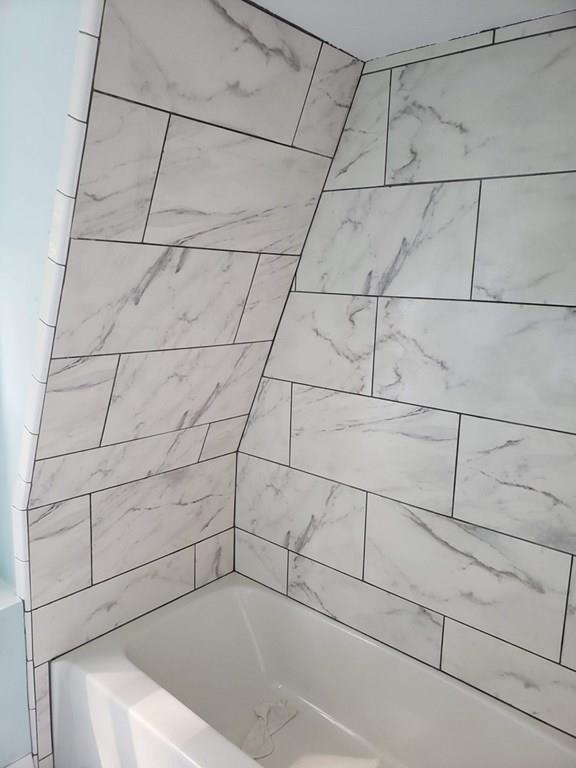 198 Lebanon Hill Road Southbridge, MA 01550 - Photo 35 of 37 a bathroom with a bathtub